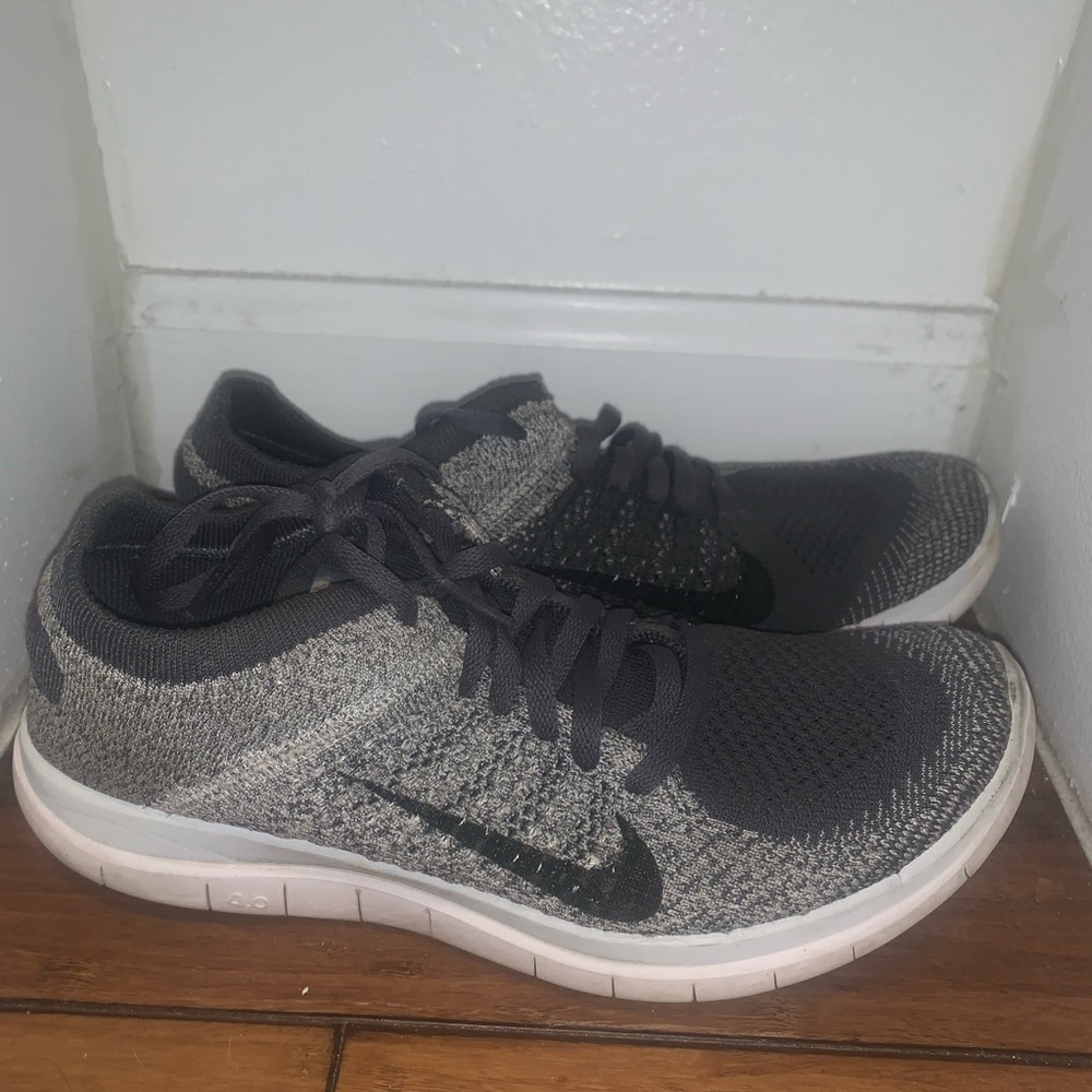 Gray Nike flyknit shoes